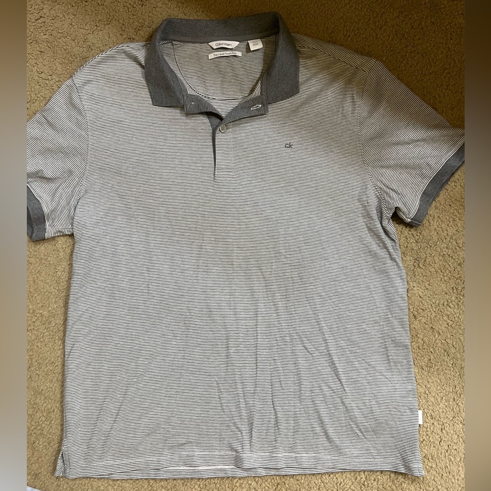Grey white striped CK polo size Large .